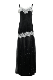 Black evening gown with white lace details on a white background