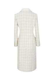 Long white coat with a pattern on a white background